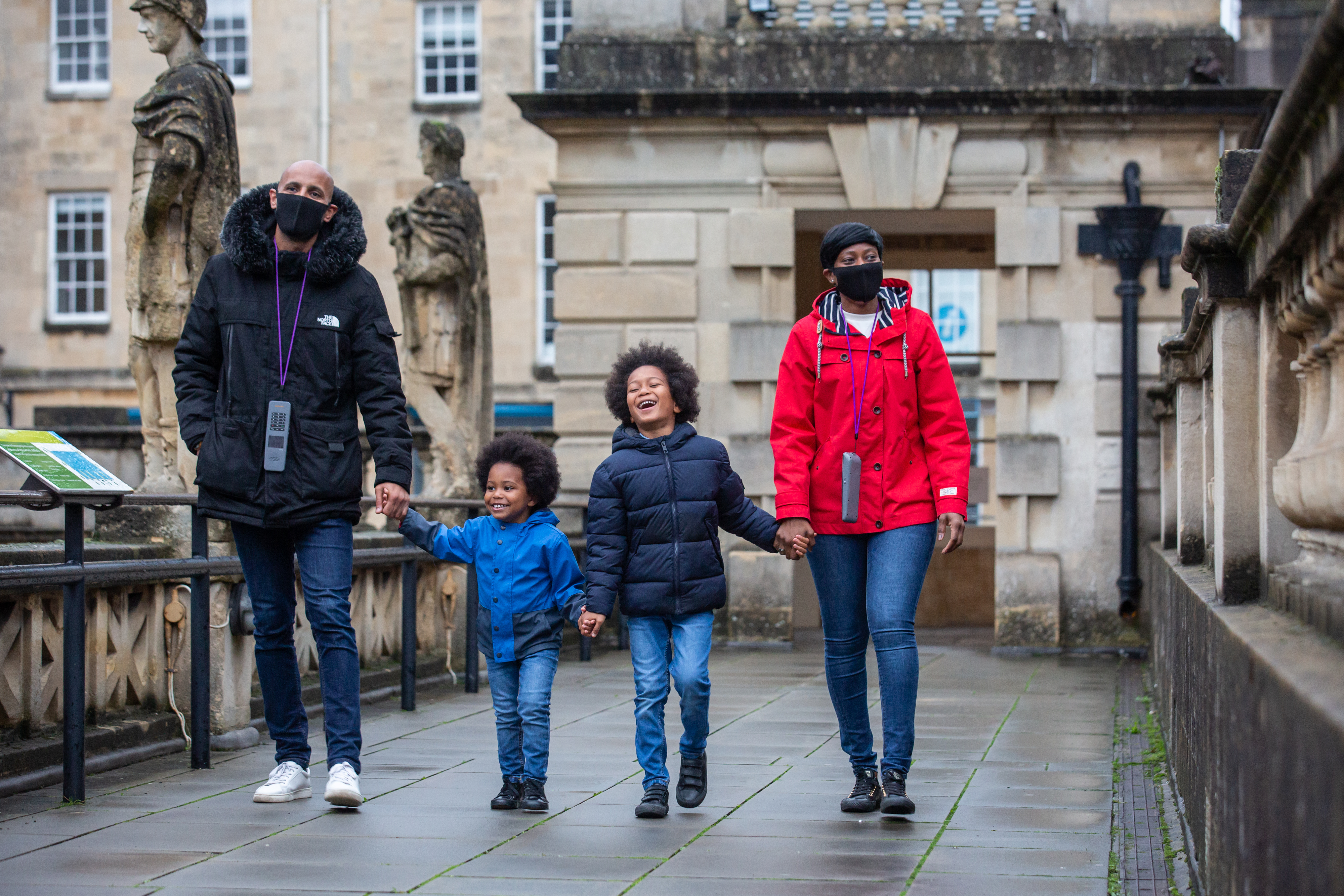 Image: Family visiting the Roman Baths