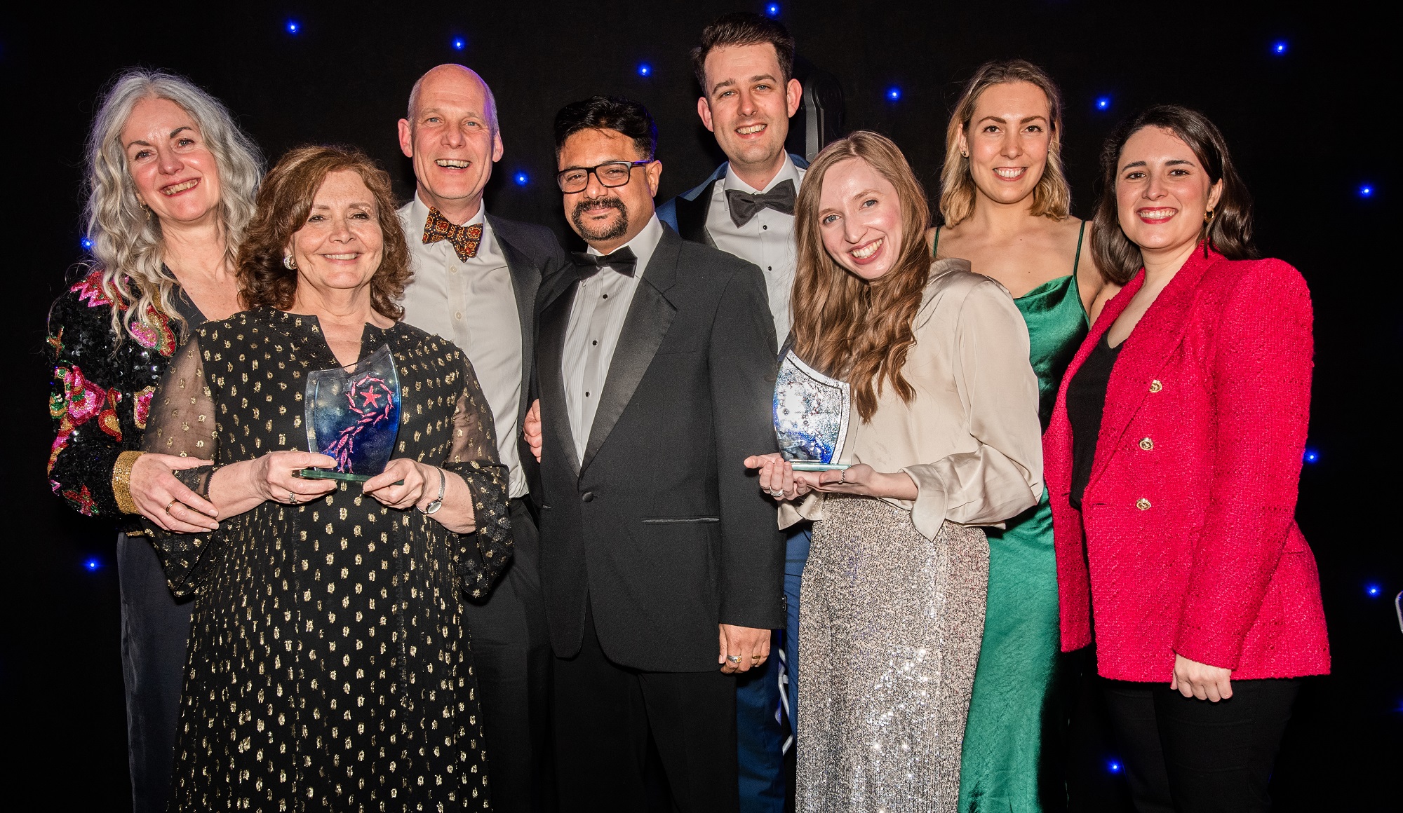 Members of staff from the Roman Baths holding their awards