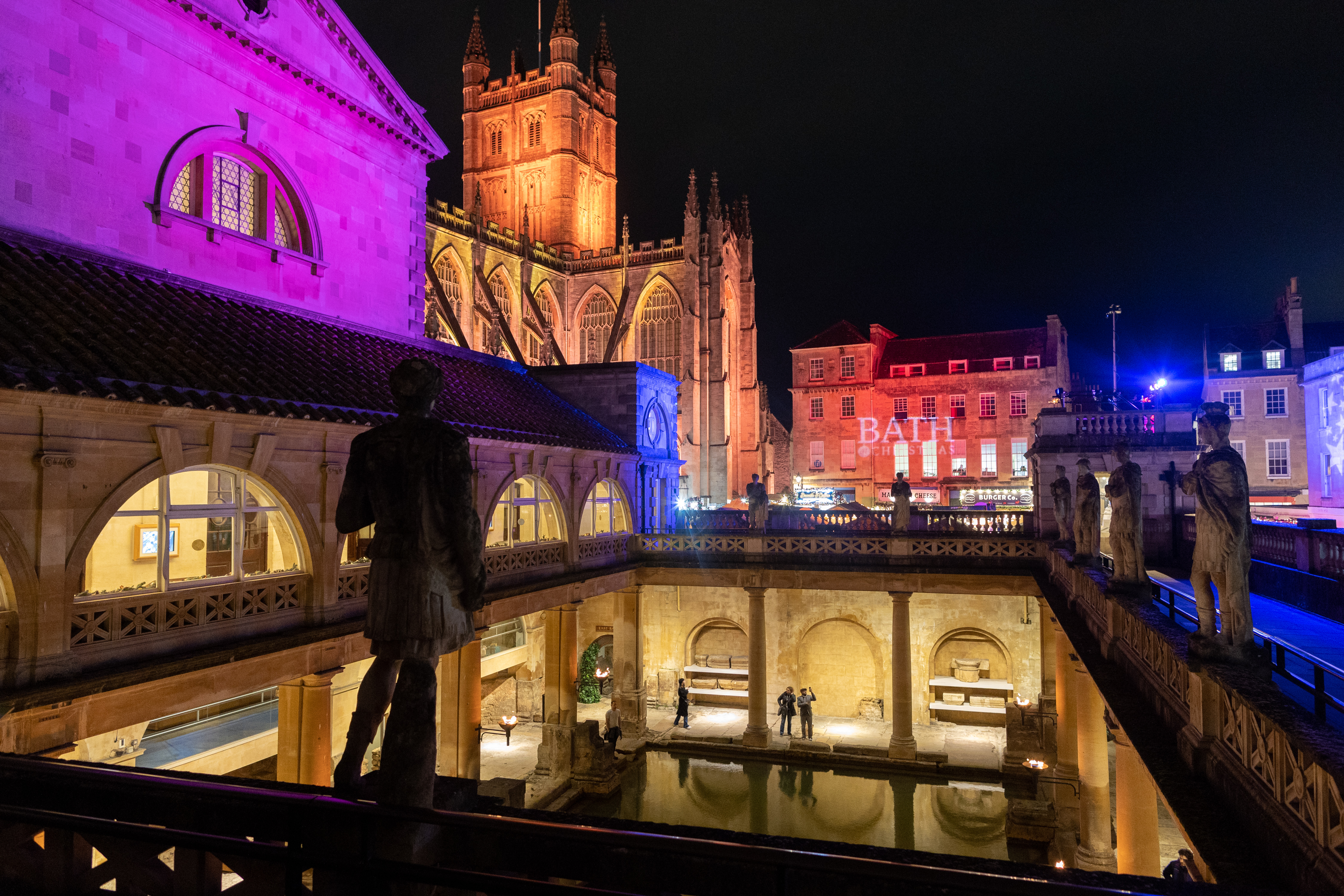 Image: The Roman Baths and Bath Abbey lit up at night