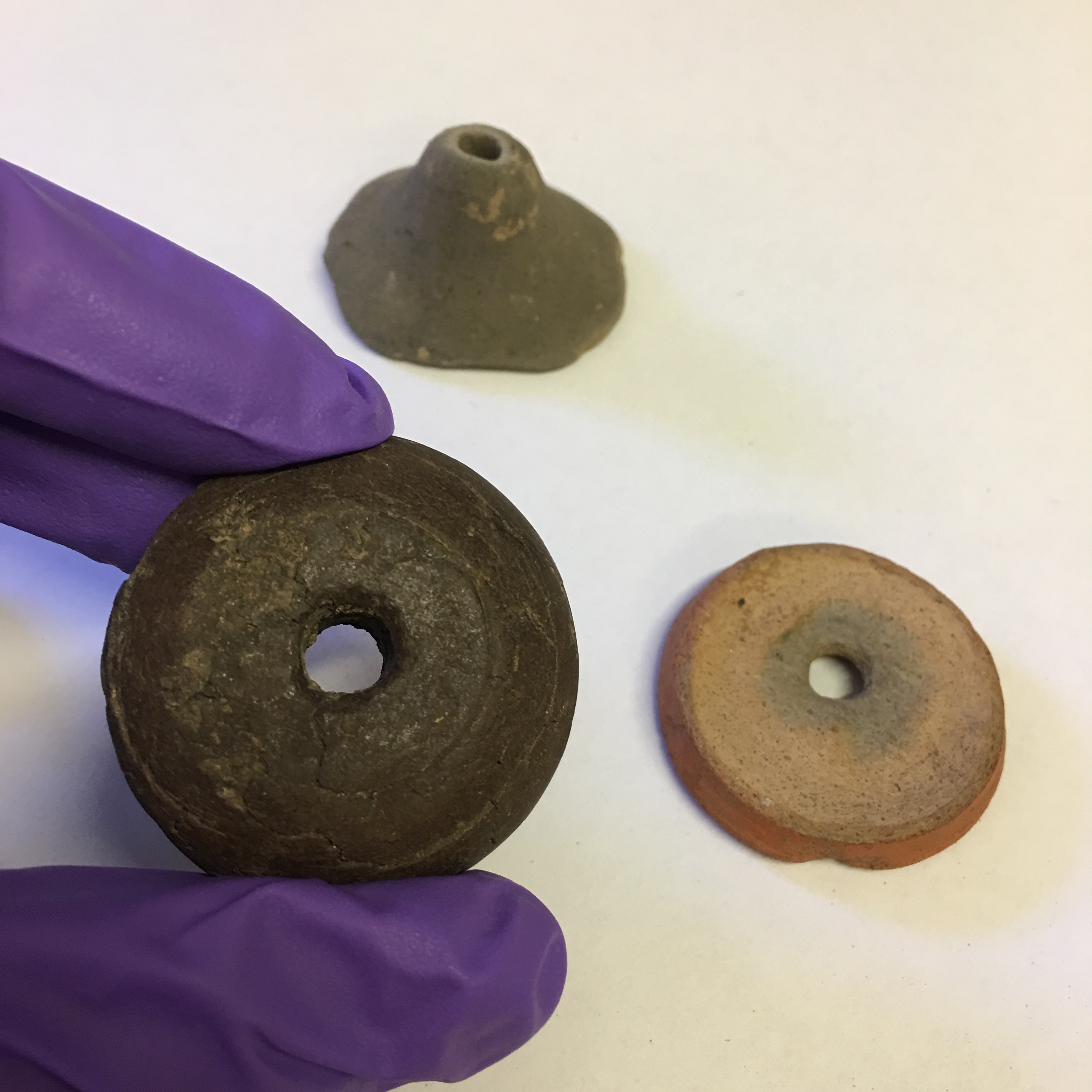 remains of Roman spindle whorls