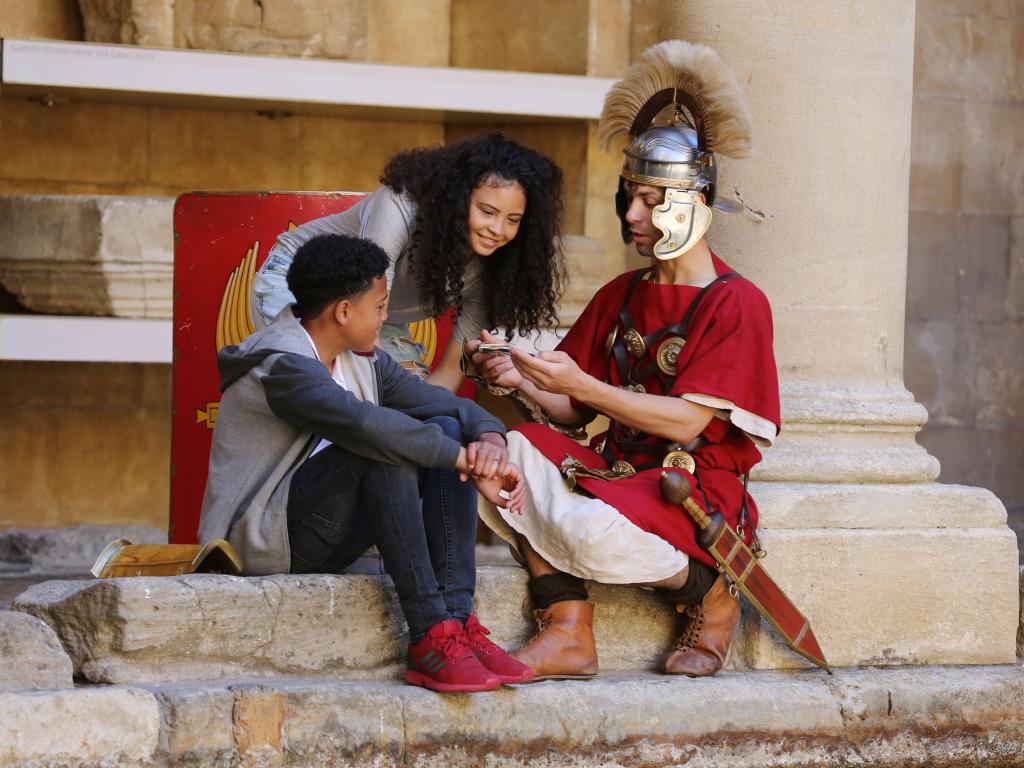 Image: Family interacting with a costumed character