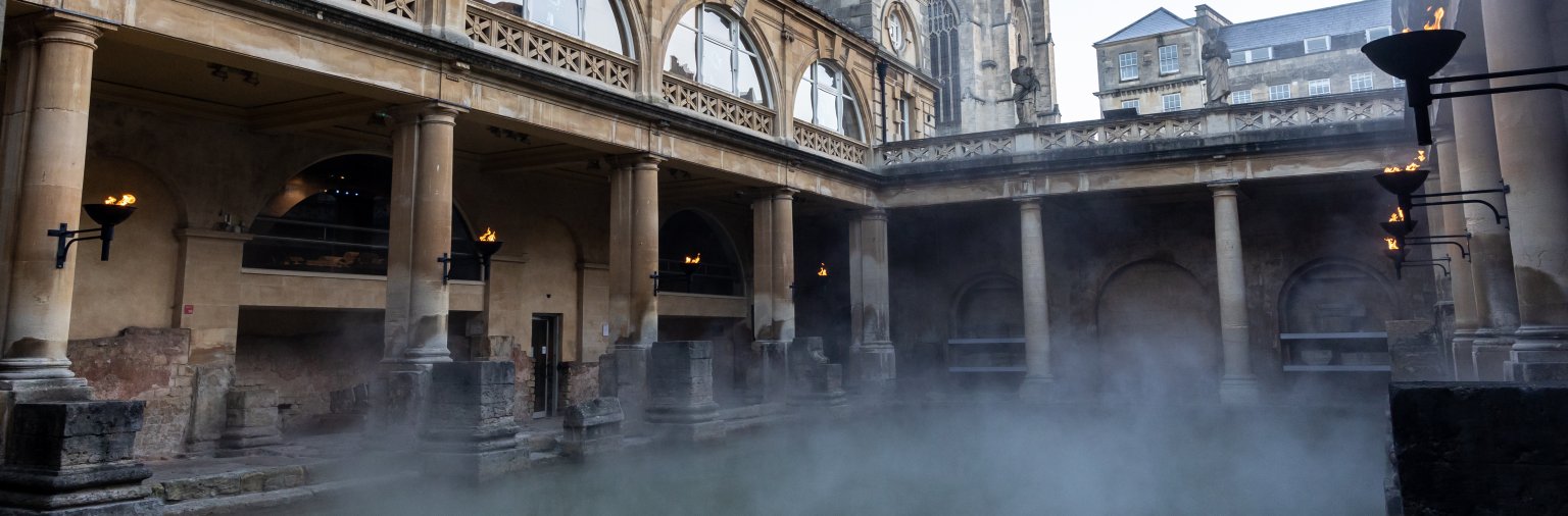 The Roman Baths with steam rising 