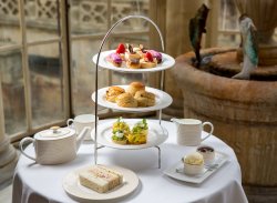 Image: An afternoon tea laid out on a table in the Pump Room