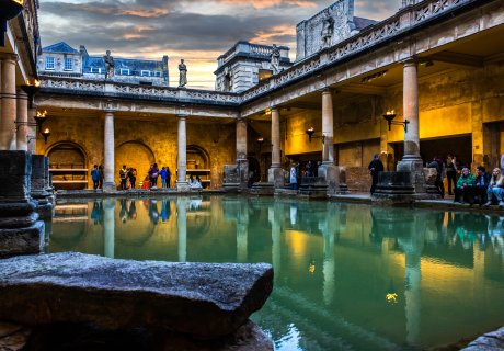 The Great Bath illuminated by torchlight in the summer
